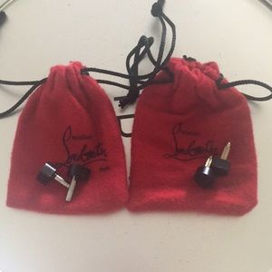 Authentic Christian Louboutin pouches with tips